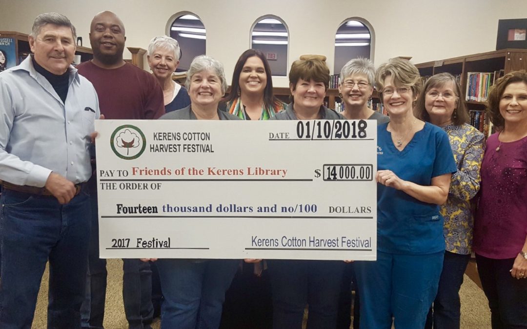The Kerens Cotton Harvest Festival Committee presented a $14,000 check to the Kerens Library